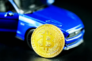 Blue car with a gold coin in front of it 